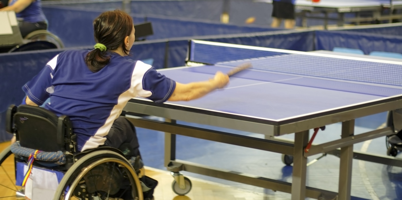 A table tennis player on a wheelchair